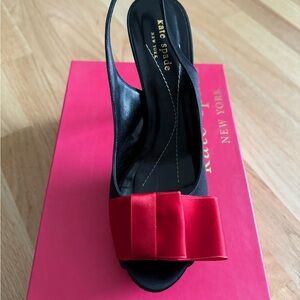 Kate spade black satin with red ribbon